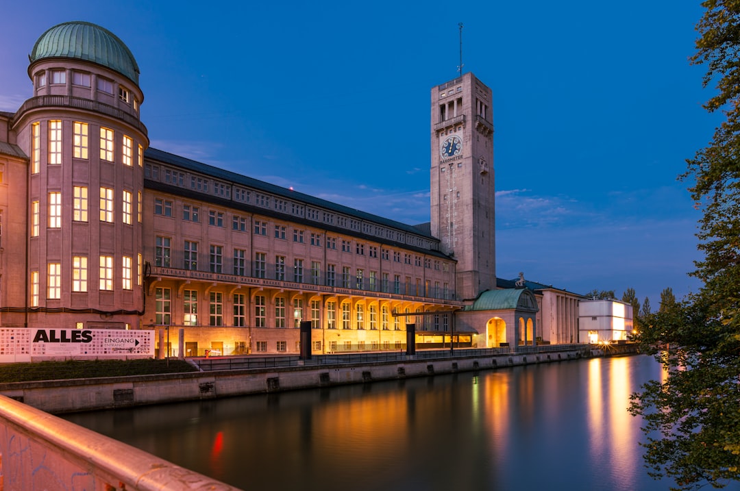 A large building next to a body of water